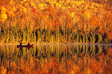 Canoeists at Sunrise, Lac Bouchard, La Mauricie National Park Quebec.