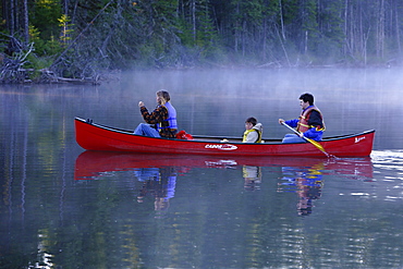 Family Canoeing on Trout Pond, Gaspesie Wildlife Reserve, Quebec