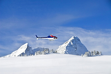 Helicopter above Mount Sir Donald, Selkirk Mountains, British Columbia