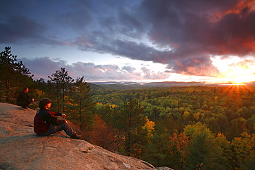 Hikers on Lookout Trail at Sunset in Autumn, Algonquin Park, Ontario