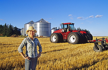 Farm Girl in front of Tractor, Dugald, Manitoba