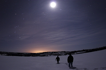 Walking across Prosperous Lake, located about 30 kilometres outside Yellowknife along the Ingraham Trail in Northwest Territories.