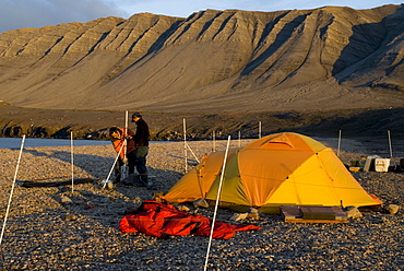 Tenting with electric bear fence, Tay Bay, Bylot Island, Sirmilik National Park, Nunavut, Canada