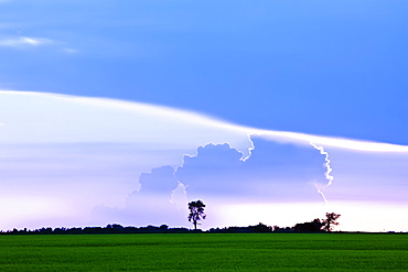 Storm clouds at sunset on Canadian Prairie, Pembina Valley, Manitoba