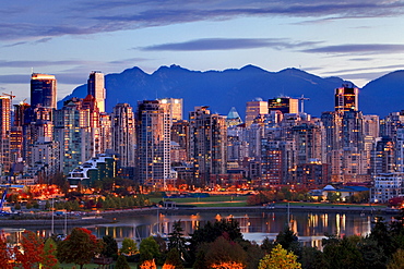 View of skyline with Yaletown, False Creek and North Shore Mountains, site of 2010 Winter Olympics, Vancouver, British Columbia