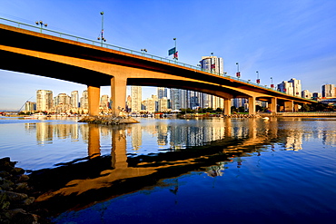 View under Cambie Street Bridge from False Creek to condominiums of Yaletown, Vancouver, British Columbia