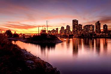 Night view from Athlete's Village to Yaletown condominiums and downtown, False Creek, Vancouver, British Columbia