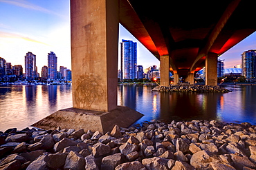 View under Cambie Street Bridge from False Creek to condominiums of Yaletown, Vancouver, British Columbia