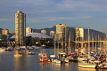 View of False Creek to condominiums of Yaletown and BC Place Stadium, venue for the 2010 Winter Olympics, Vancouver, British Columbia