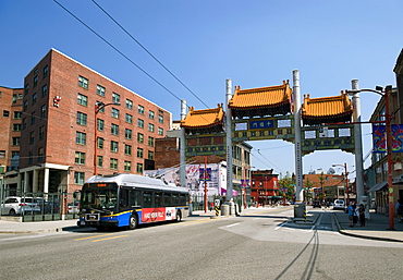 Millennium Gate and bus on East Pender Street, Chinatown, Vancouver, British Columbia