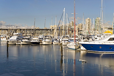 Snow covered pleasure boats, False Creek at Granville Island, Vancouver, British Columbia