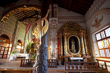 Carved wooden image of Christ, the Redeemer in the Mestizo-Baroque style on a column of the Jesuit Mission of San Ignacio de Velasco, Santa Cruz Department, Bolivia