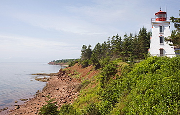 Lighthouse overlooking coastline, Cape Bear, Prince Edward Island