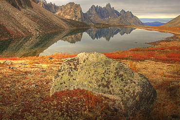 Tombstone Mountain reflected in Talus Lake in autumn, Tombstone Territorial Park, Yukon