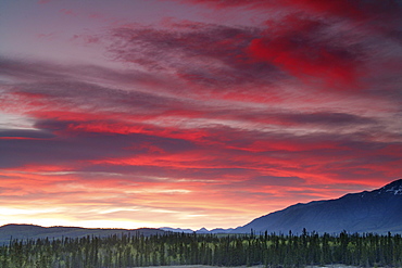 Sunset over Mountains along the Alaska Highway outside Whitehorse, Yukon