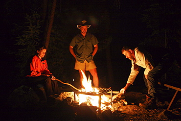 People around a Campfire, Missinaibi Lake, near Chapleau, Ontario