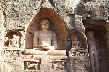 Jain sculptures carved in to the cliff on the southern approach to the fort, Gwalior, Madhya Pradesh, India