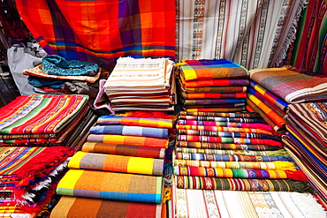 Andean textiles for sale at the Saturday crafts market, Otavalo, Imbabura, Ecuador