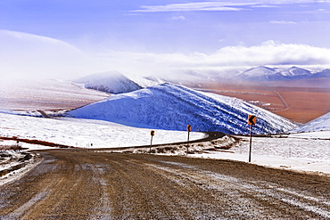 Snow along Dempster Highway and fog over Richardson Mountains, Yukon