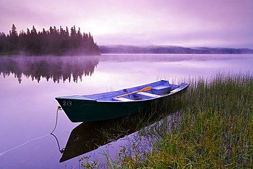 Boat in mist at dawn, Rimouski Lake, Rimouski Wildlife Reserve, Bas-Saint-Laurent region, Quebec