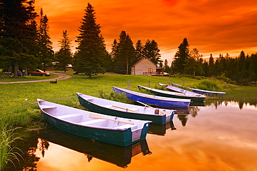 Boats and cottage at dusk, Rimouski Lake, Rimouski Wildlife Reserve, Bas-Saint-Laurent region, Quebec