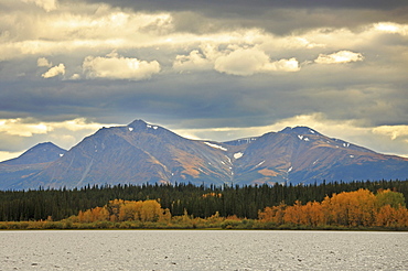 Storm clouds above Dawson Peaks in autumn, Teslin, Yukon