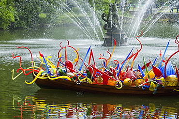 Thames Skiff by Dale Chihuly in front of the Palm House Royal Botanic Gardens, Kew, Surrey, England, United Kingdom