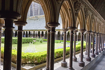 Double colonnade surrounding the garden of the Cloister of the Abbey of Mont-Saint-Michel, France