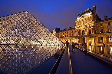 Louvre Pyramid by the architect I.M. Pei and Richelieu Wing of the Louvre Museum at night, Paris, France