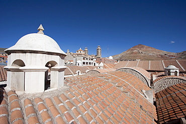 Roofs of the Casa Nacional de Moneda (National Mint) with Cerro Rico in the background, Potosi, Bolivia