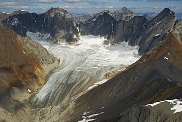 Cirque of Unclimbables, a circle of granite walls which draws rock climbers from all over the world. Britnell Glacier in background, Nahanni National Park, Northwest Territories