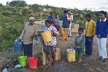 People at a water well in Fianarantsoa, Madagascar