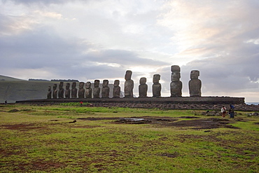 Fifteen moais from different periods, restored by archaeologist Claudio Cristino, at Ahu Tongariki at dawn, Rapa Nui (Easter Island), Chile