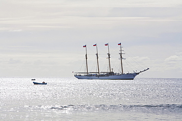 The four-mast barquentine, Chilean Navy Training Ship Esmeralda in Hanga Roa Harbour, Rapa Nui (Easter Island), Chile