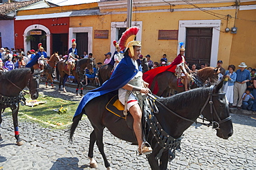 Men dressed as Roman soldiers on horseback at the Procession of the Holy Cross on Good Friday in Antigua Guatemala, Sacatepuquez, Guatemala