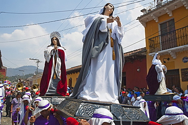 Men carrying the andas (floats) of the Virgin Mary at the Procession of the Holy Cross on Good Friday in Antigua Guatemala, Sacatepuquez, Guatemala