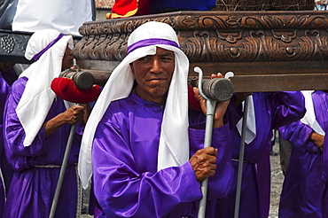 Men carrying the andas (Floats) of Saints during the Procession of the Holy Cross on Good Friday in Antigua Guatemala, Sacatepuquez, Guatemala