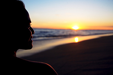 Hawaii, Oahu, Silhouette of a female at sunset