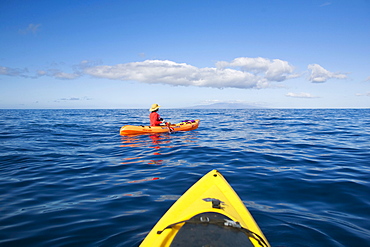 Hawaii, Maui, Kayakers on the south coast of Maui.