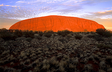 Australia, Northern Territory, Yulara, Uluru-Kata Tjuta National Park, Ayer's Rock, dramatic skies.