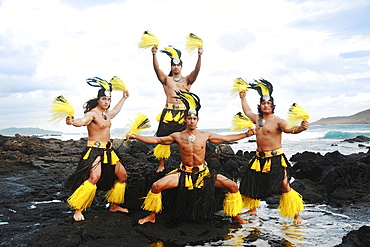 Hawaii, Oahu, Group of Tahitian Male Dancers posing.