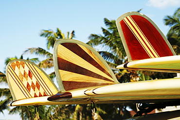 Hawaii, Oahu, Colorful Hawaiian design surfboards fins.