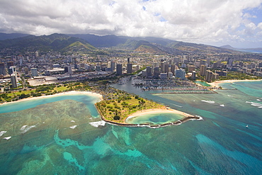 Hawaii, Oahu, Honolulu, Aerial of Magic Island, Ala Wai Yacht Basin and Ala Moana Beach Park.