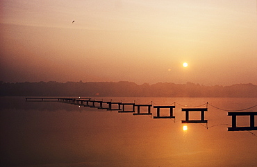 New Jersey, Cape May, Sunrise over inland waterway, Reflections in smooth water.