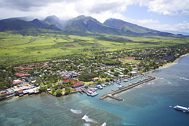 Hawaii, Maui, Aerial of Lahaina, West Maui Mountains in background.