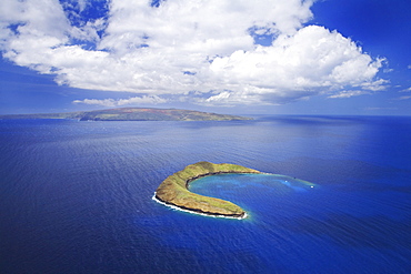 Hawaii, Maui, Molokini with Kaho'olawe in the distance.