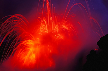 Hawaii, Big Island, Hawaii Volcanoes National Park, Lava Exploding as lava flow hits the ocean