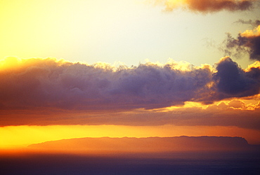 Hawaii, Sunset over Niihau, from Kauai, golden sky