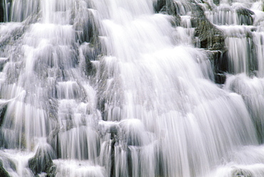 Guam, Talofofo Falls, closeup of falls rushing through rocks into pool