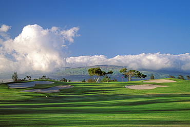 Hawaii, Big Island, Waikoloa Village Golf Course 5th hole with sand traps, shadows, blue sky